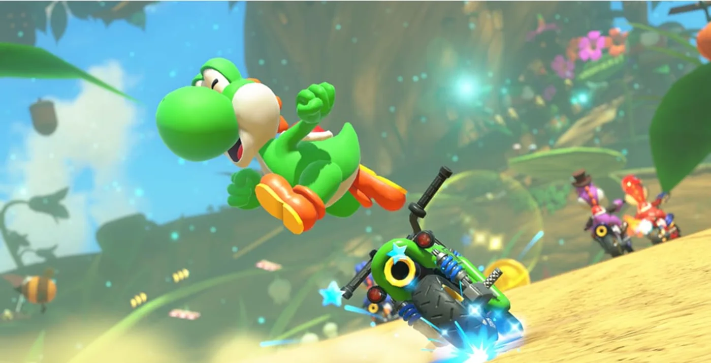 Yoshi executa uma manobra em uma pista de Mario Kart World